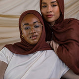 Two Models wearing breathable modal hijab inspired by natural spice tones and crafted in small batches.