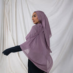 VELA hijab in Taro Tea, a muted purple tone with creamy warmth, inspired by the cozy calm of a spring tea ritual.