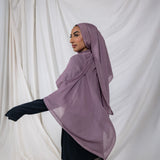VELA hijab in Taro Tea, a muted purple tone with creamy warmth, inspired by the cozy calm of a spring tea ritual.