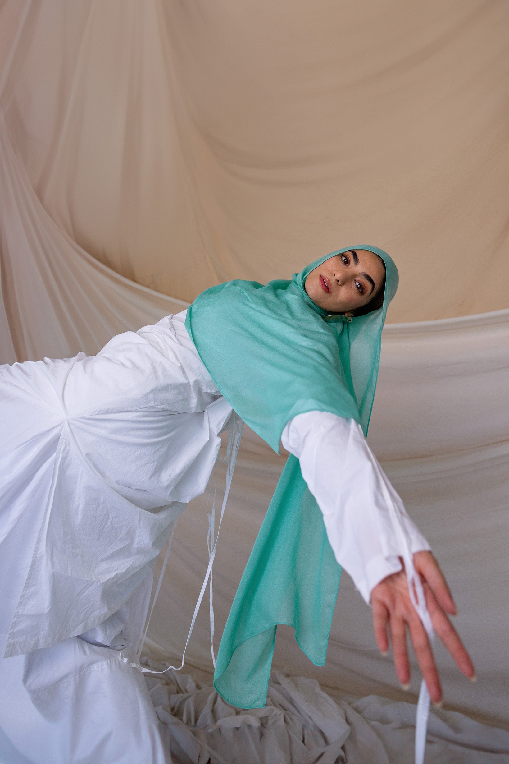 Soft woven hijab by VELA in a serene blue shade, perfect for effortless summer styling.