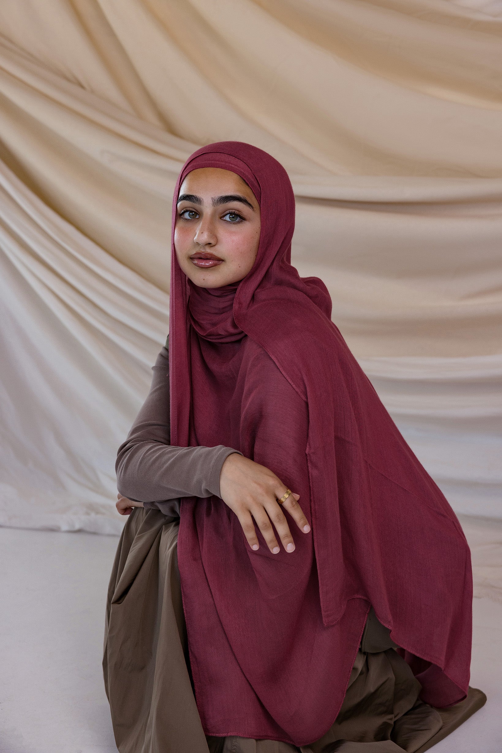 Model wearing modal hijab inspired by earthy spices, crafted for breathable comfort.