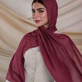 Model wearing lightweight modal hijab with a rich, tart spice-inspired finish.