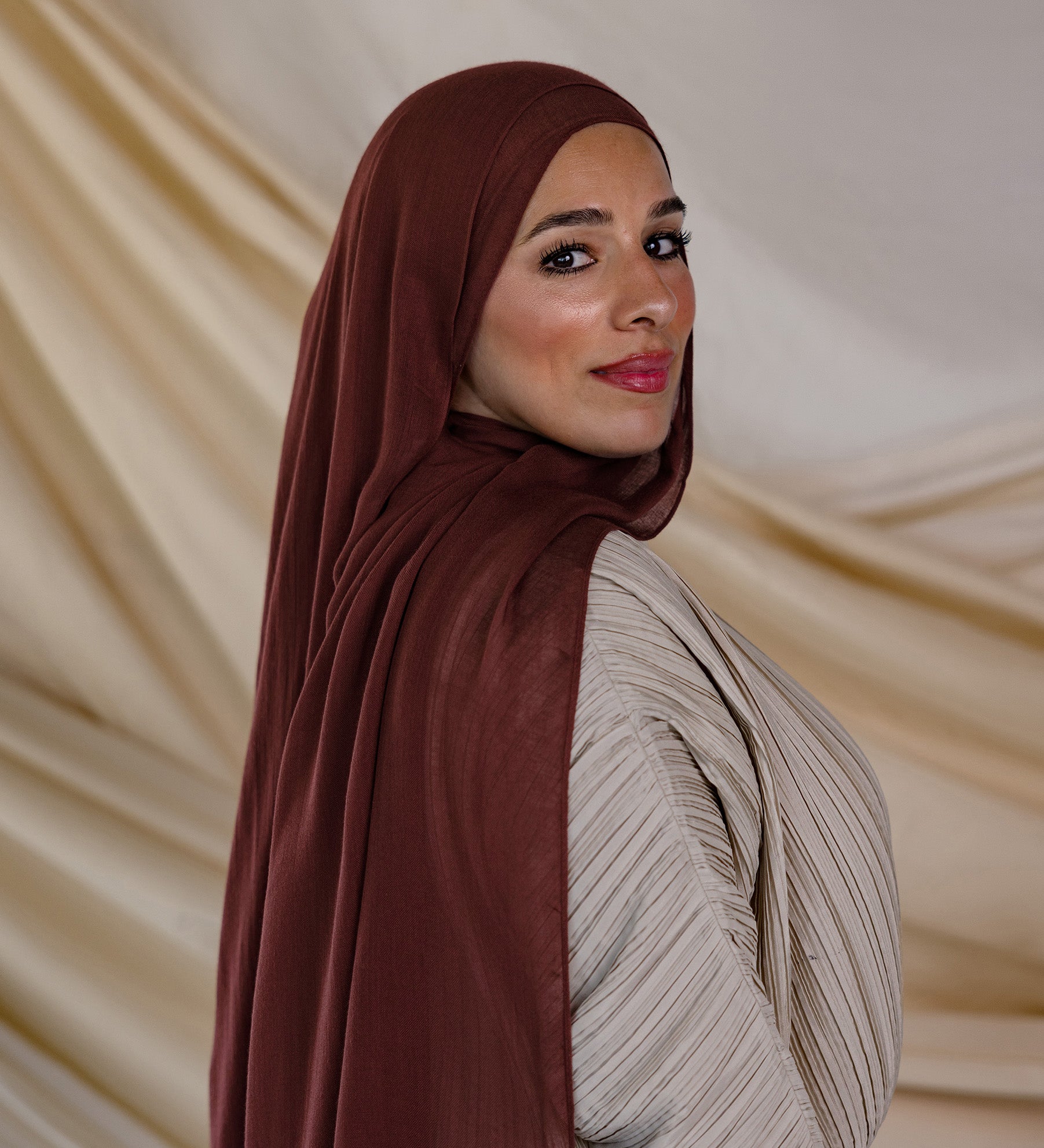 Model wearing hand-dyed modal hijab with earthy inspiration and lightweight feel.