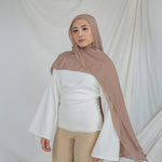Light Taupe modal hijab with warm undertones that go with both soft and bold colors.
