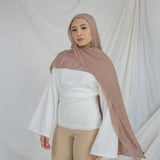 Light Taupe modal hijab with warm undertones that go with both soft and bold colors.