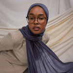 Model wearing soft modal hijab with a dreamy, lightweight drape and calming tone