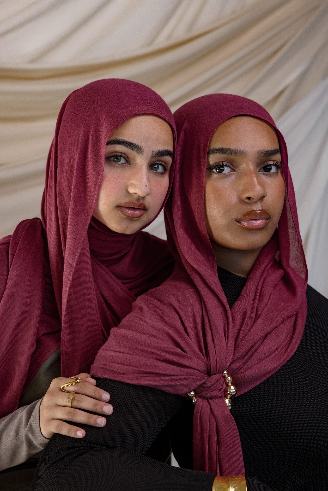 Two Models wearing hand-dyed modal hijab featuring warm, nature-rooted tones.