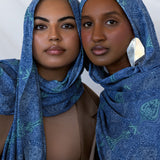 Two models styled in a blue toned paisley print hijab.