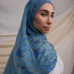 Instant hijab featuring hand-printed Islamic patterns inspired by Afghan architecture.