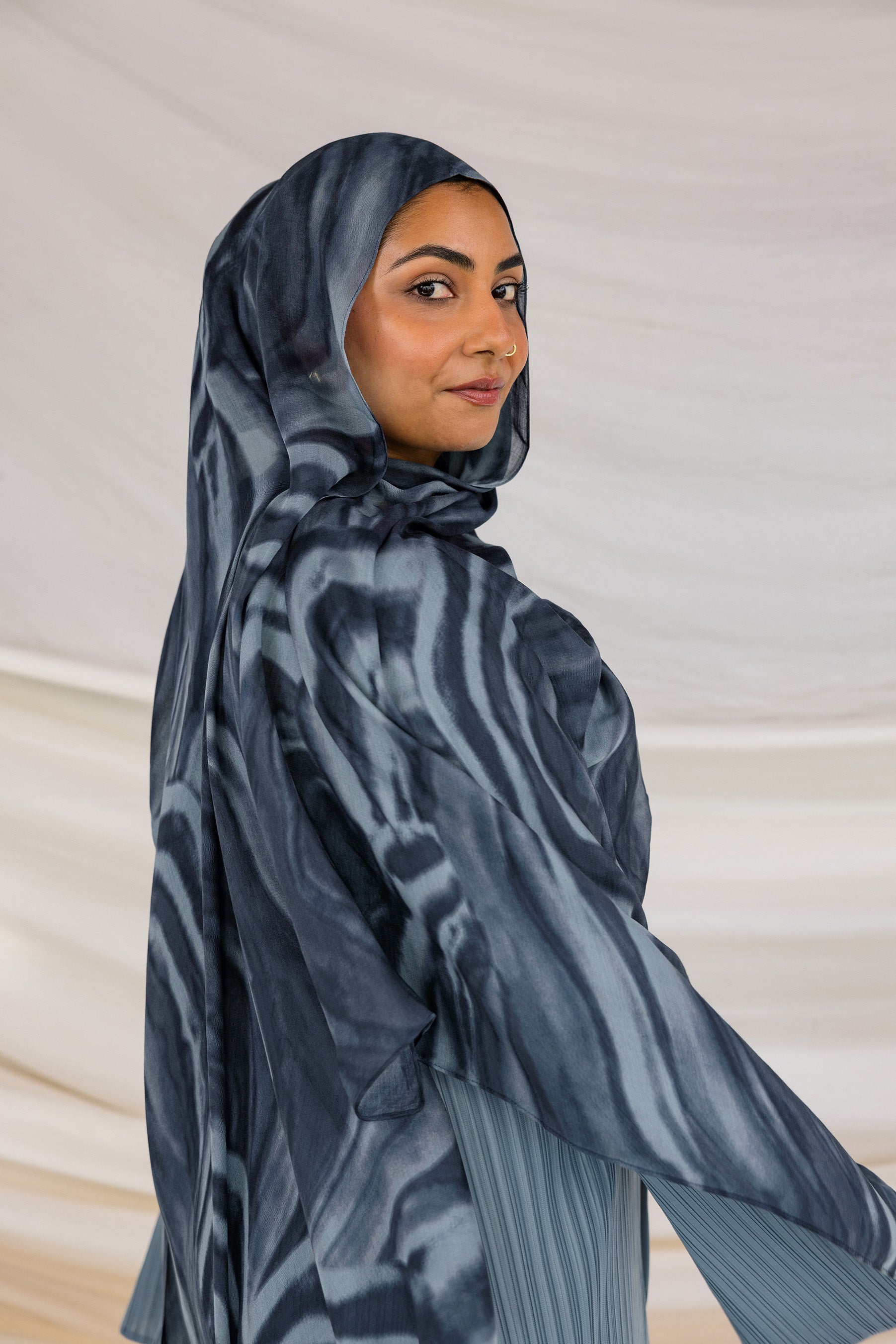 Sediment print hijab made in soft modal, designed for effortless pairing.