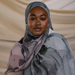 Watercolor-style hijab in calming tones, made from smooth and breathable modal fabric.