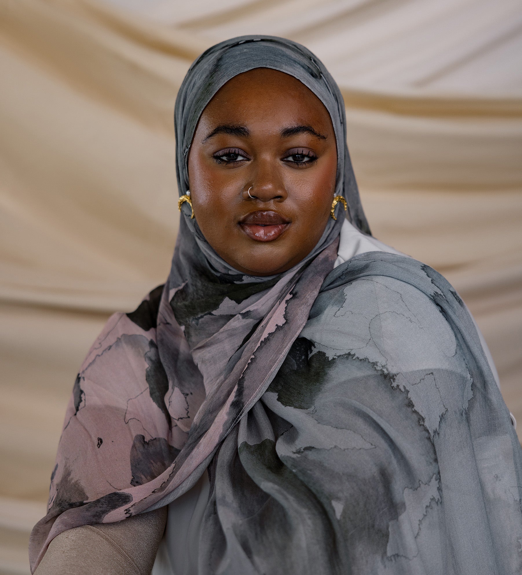 Watercolor-style hijab in calming tones, made from smooth and breathable modal fabric.