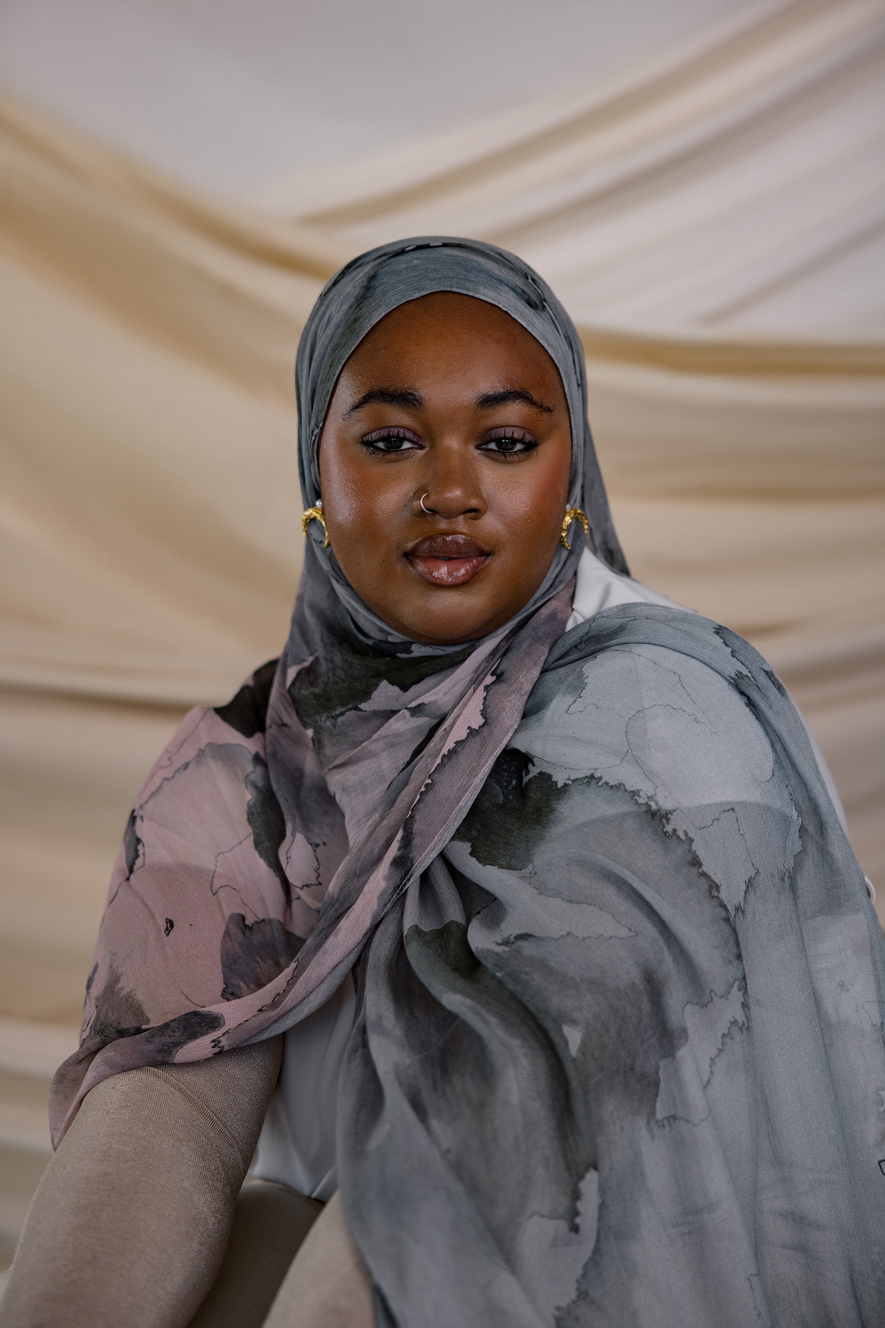 Watercolor-style hijab in calming tones, made from smooth and breathable modal fabric.