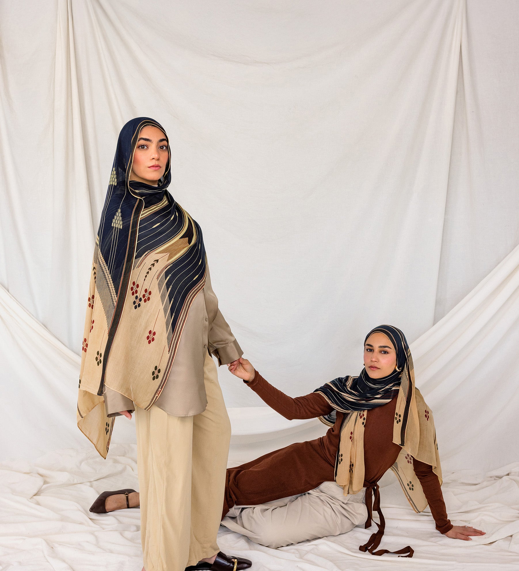 Lightweight hijab with a heritage-inspired print drawn from traditional cushion weaving.