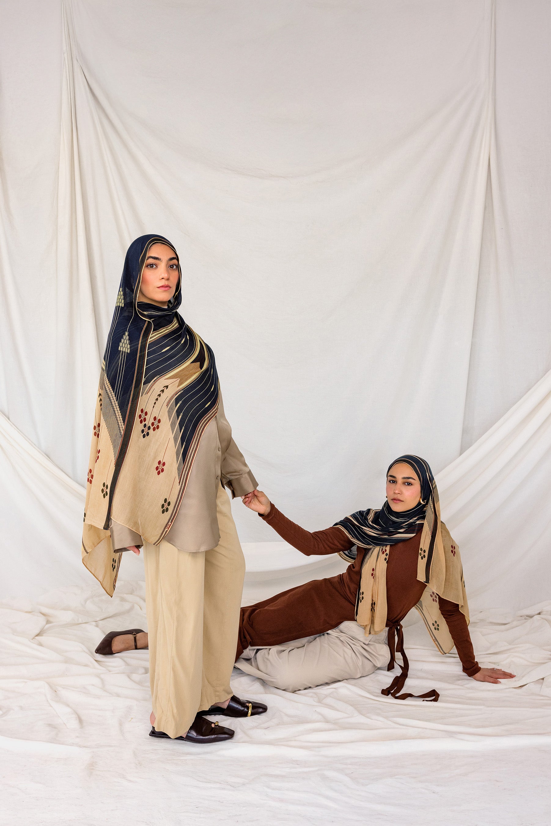 Lightweight hijab with a heritage-inspired print drawn from traditional cushion weaving.
