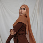 Cinnamon modal hijab by VELA, blending cozy richness with a whisper of bold, everyday elegance.