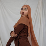 Cinnamon modal hijab by VELA, blending cozy richness with a whisper of bold, everyday elegance.
