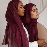 Models in angled poses wearing the Maroon hijab, showcasing different styling perspectives in coordinated outfits.