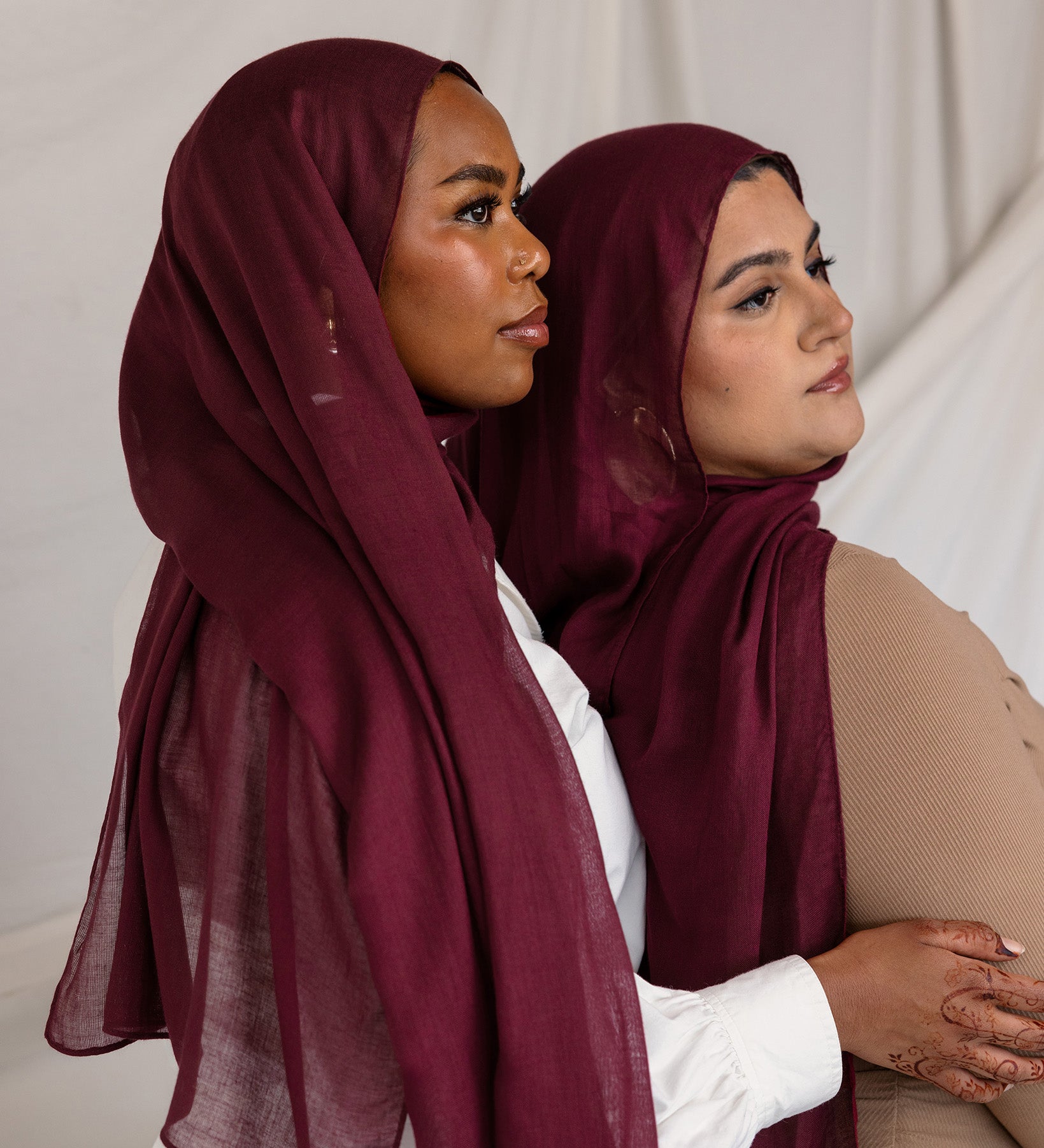 Models in angled poses wearing the Maroon hijab, showcasing different styling perspectives in coordinated outfits.