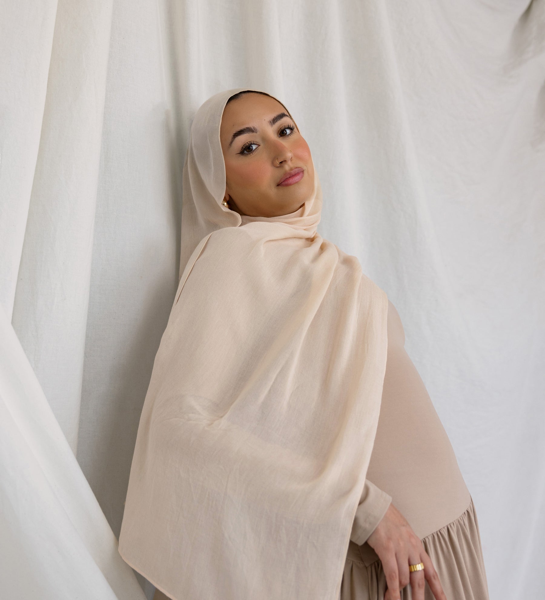 Sand modal hijab by VELA, offering lightweight comfort and a glowing neutral shade for daily wear