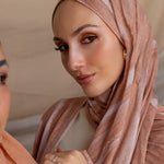 Printed hijab with soft flowing pattern and timeless texture, crafted in breathable fabric