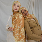 Two Models wearing flowy modal hijab featuring a subtle nature print and all-day comfort.