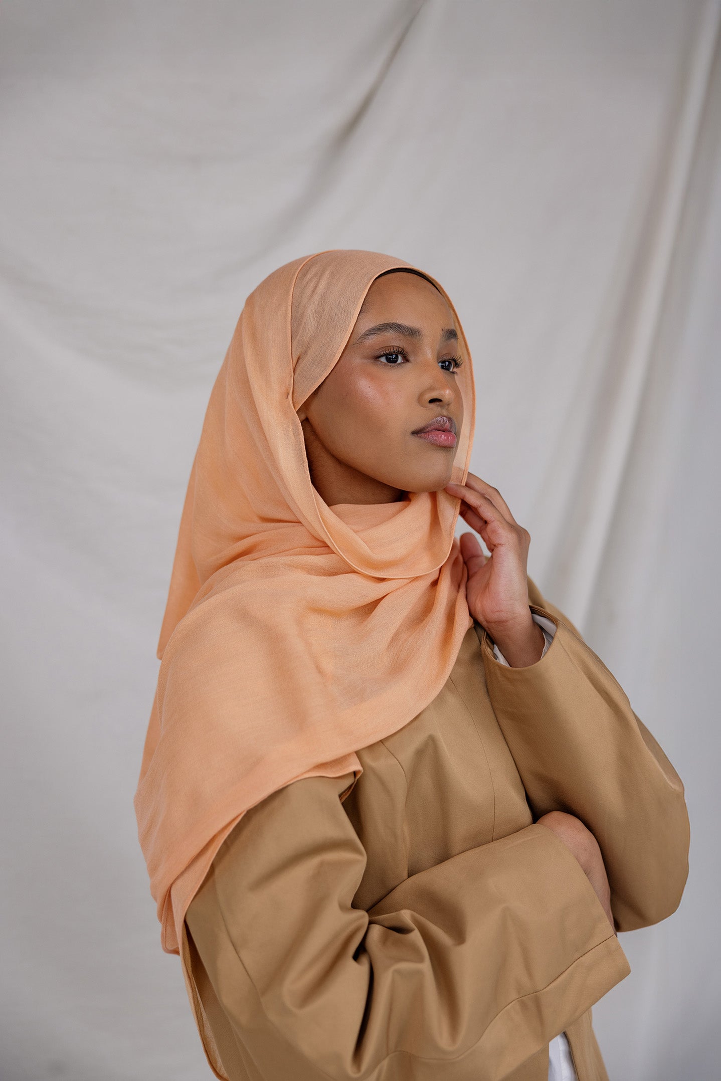 An ember-toned scarf that channels late-day light, Golden Hour adds instant warmth to any outfit