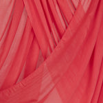 Close-up of pink coral hijab with a draped effect