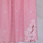 A product image showing a pink sakura printed hijab.