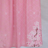 A product image showing a pink sakura printed hijab.