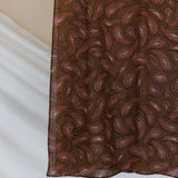 A product image showcasing a brown red toned paisley print hijab.