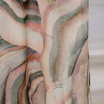 woven modal hijab featuring a colorful sediment design with natural fluidity.