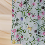 Light blue hijab with flowers, soft and breathable for a comfortable, stylish outfit.