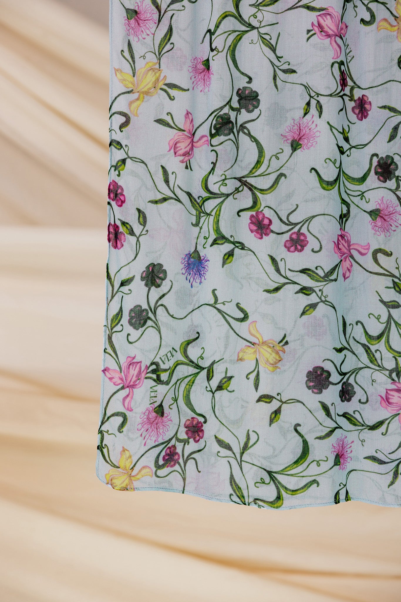 Light blue hijab with flowers, soft and breathable for a comfortable, stylish outfit.