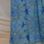 Lightweight modal hijab with keffiyeh-style details and mosque-inspired motifs.