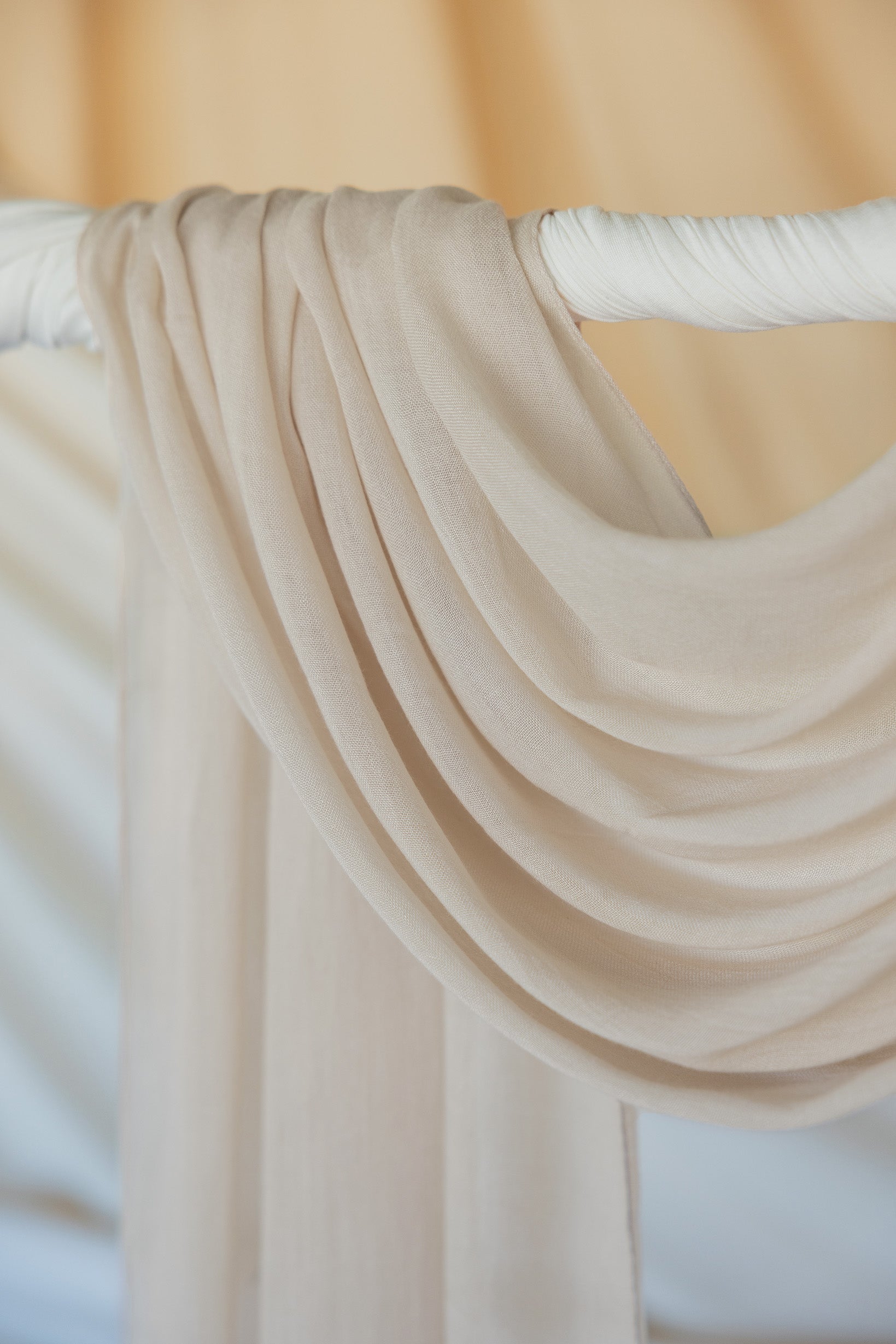 spice-toned hijab with warm undertones and classic woven finish