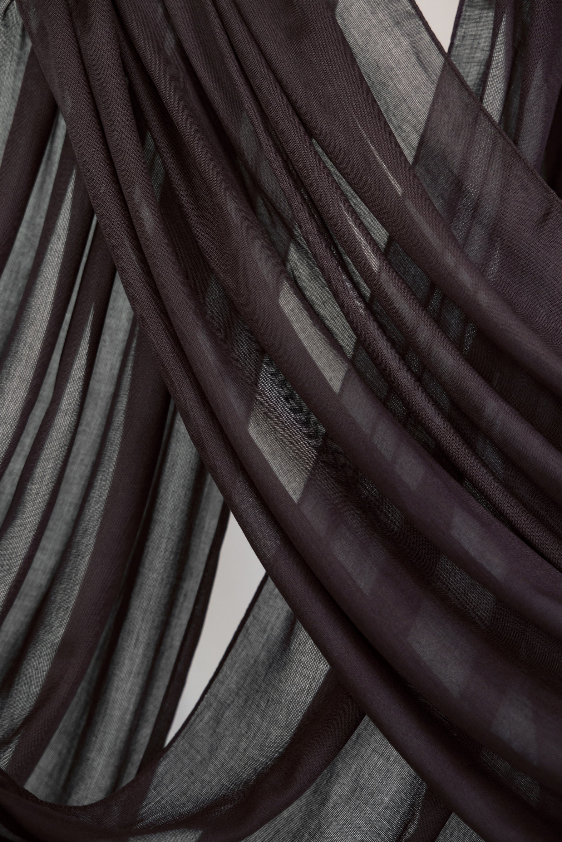 Soft modal hijab from VELA in a deep, neutral tone perfect for effortless styling