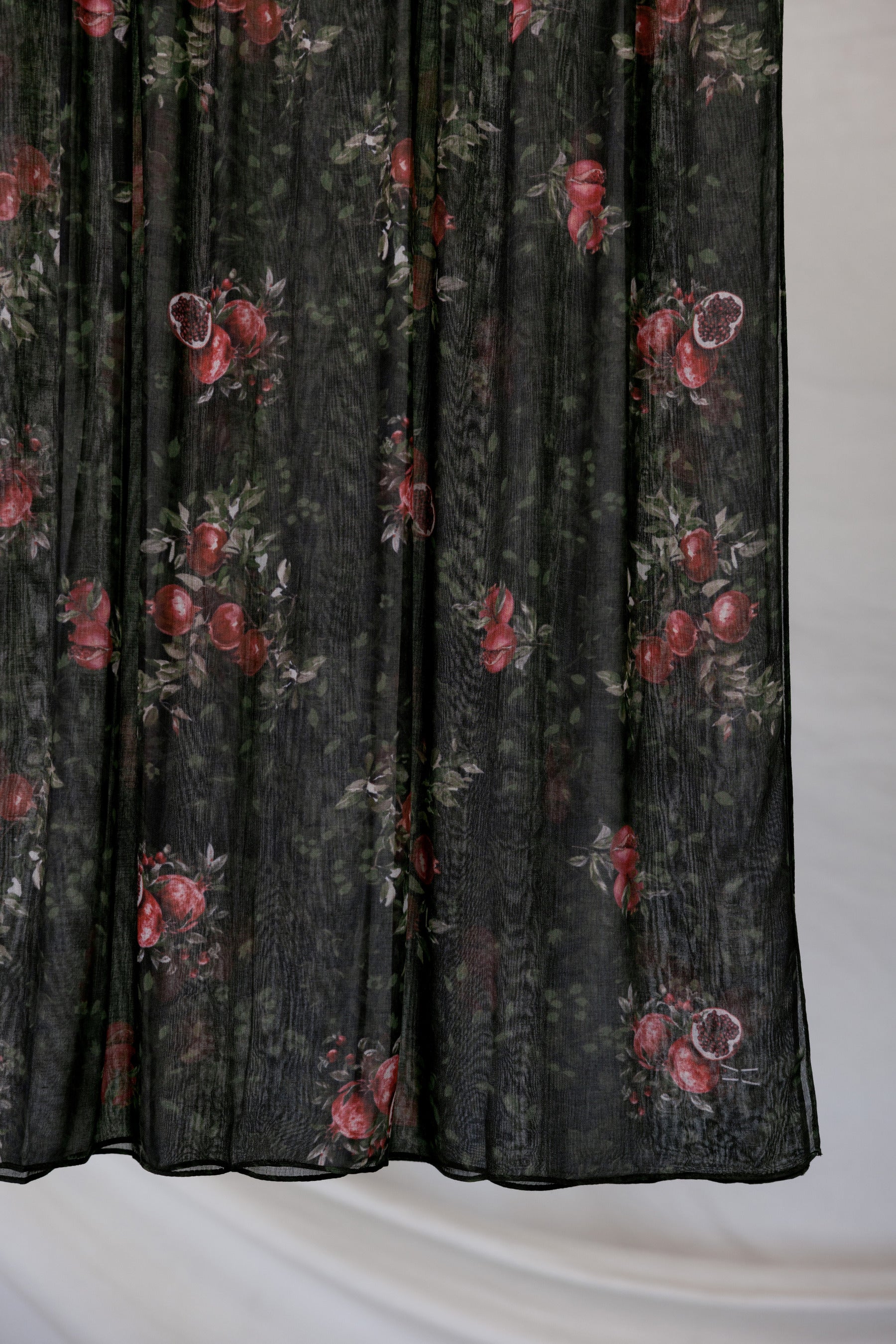 Black pomegranate printed hijab on a white background
