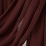 VELA modal hijab with a grounded, earth-toned aesthetic and soft finish.