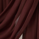 VELA modal hijab with a grounded, earth-toned aesthetic and soft finish.