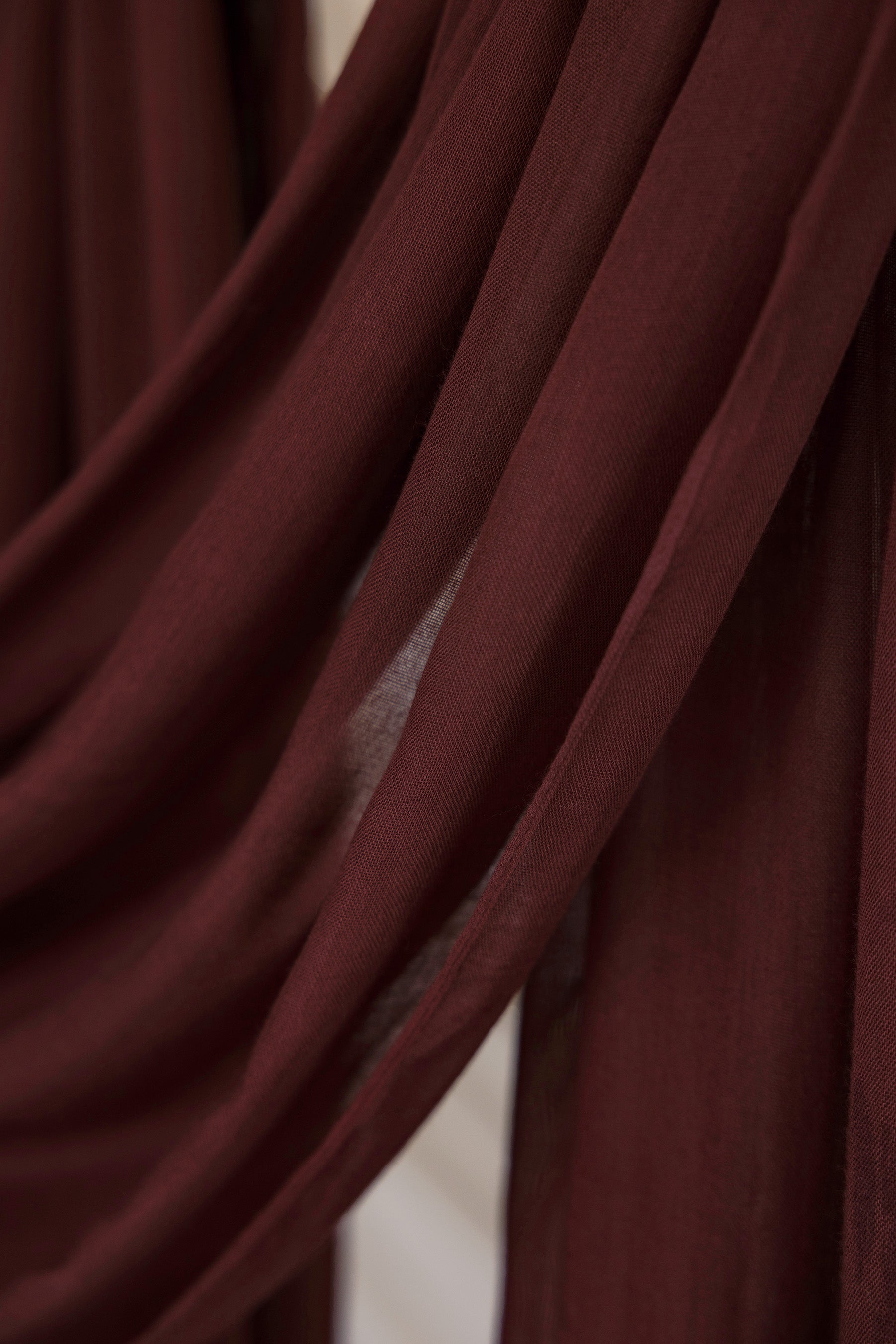 VELA modal hijab with a grounded, earth-toned aesthetic and soft finish.
