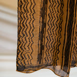 heritage-style hijab with soft woven texture and updated cultural print.