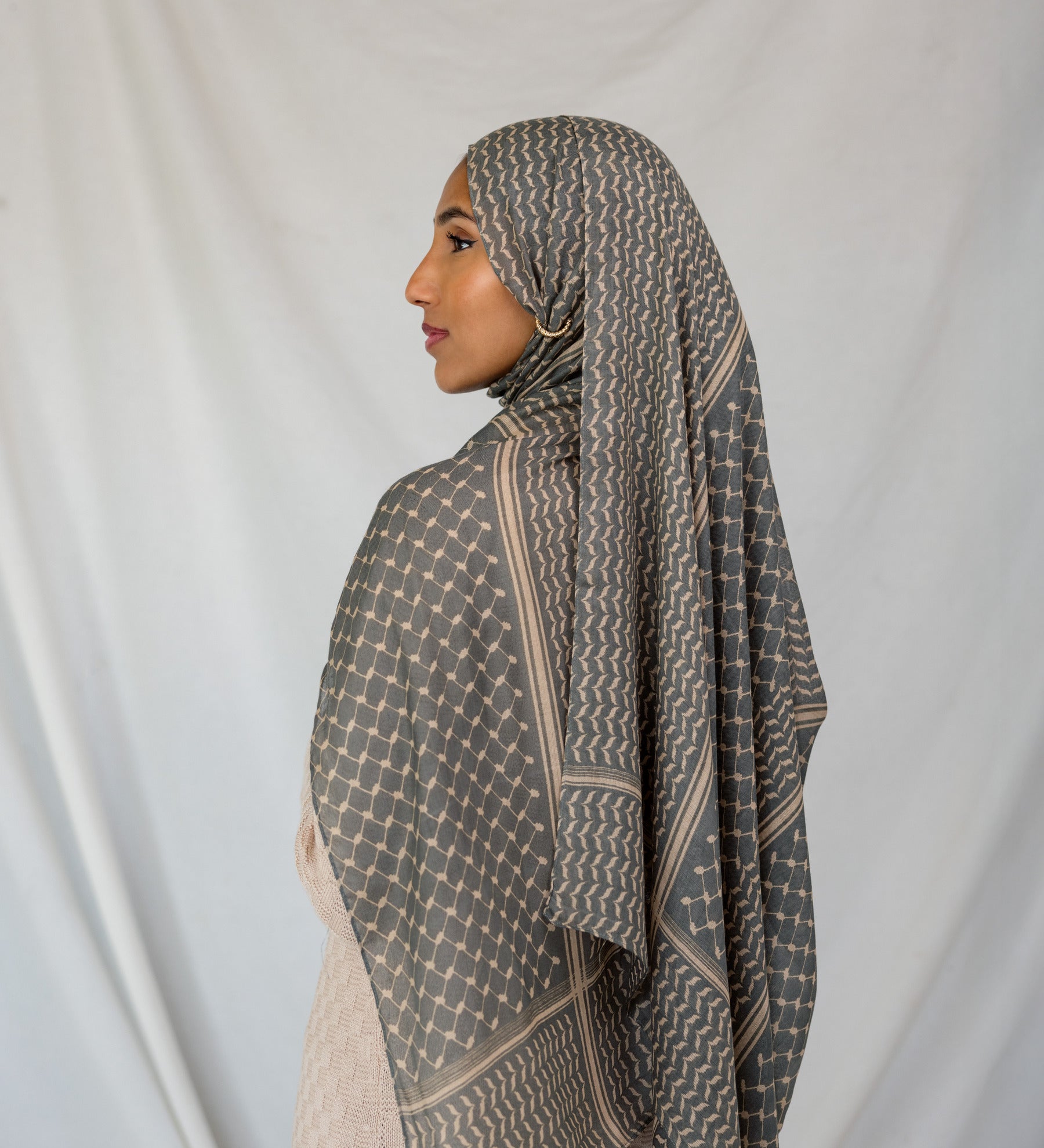 Lightweight VELA hijab featuring a bold, timeless print on signature modal
