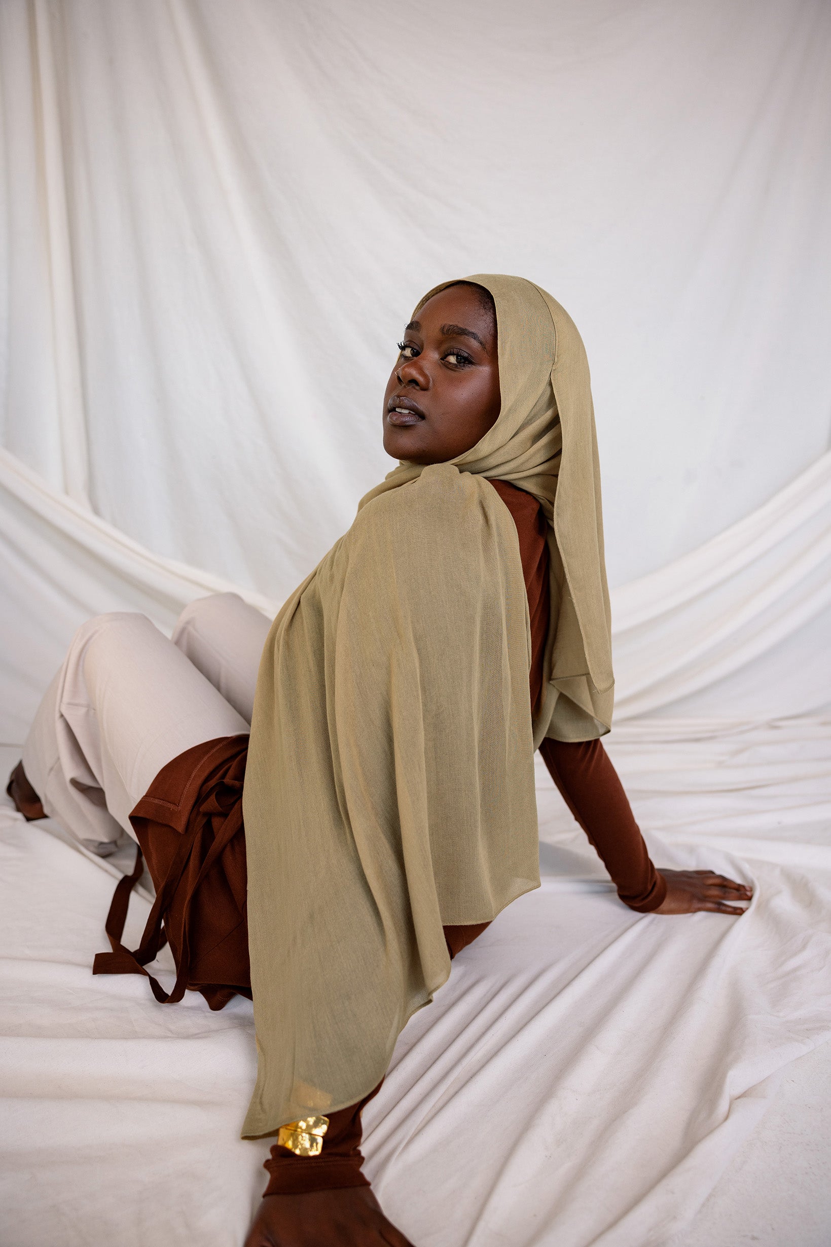 Model shot with model wearing Sandalwood, an earthy tan color by VELA.
