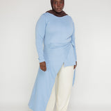 Modest high-low top crafted for comfort, coverage, and all-day versatility