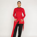 Loose-fit top designed for layering, with a flowing high-low silhouette