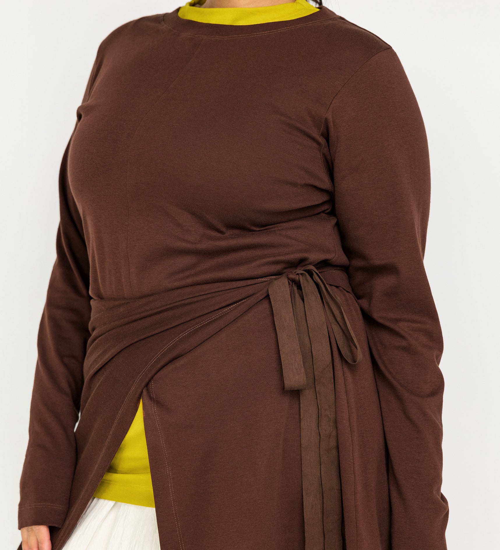 Modest long-sleeve top with a modern high-low cut and relaxed, airy shape
