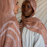 Modal hijab featuring a classic sediment-inspired print with an earthy, grounded feel.