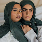 Two Models wearing breathable modal hijab that brings quiet depth and richness to any outfit.