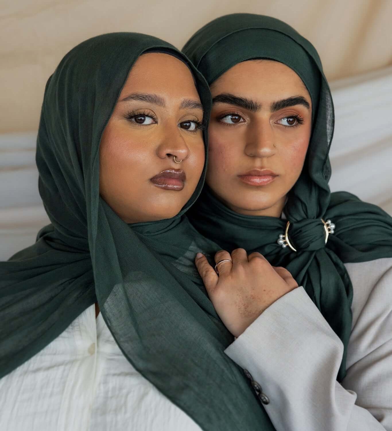Two Models wearing breathable modal hijab that brings quiet depth and richness to any outfit.